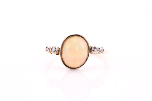 Lot 400 - An opal and diamond ring, the oval cabochon...