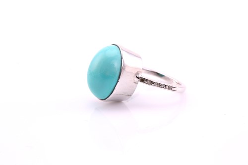 Lot 49 - A turquoise and diamond ring, the oval...