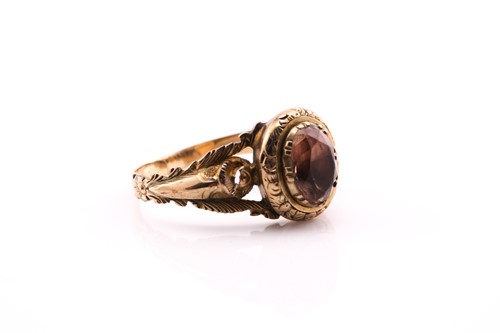 Lot 122 - An early 19th century gold and pink topaz...