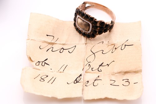 Lot 311 - A Georgian stone set mourning ring consisting...
