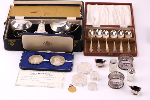 Lot 603 - An assortment of small silver items including...