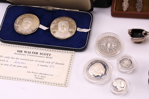 Lot 603 - An assortment of small silver items including...