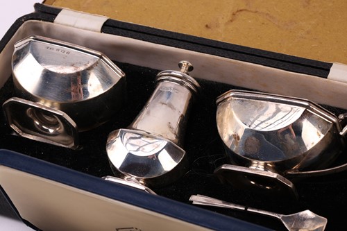 Lot 603 - An assortment of small silver items including...