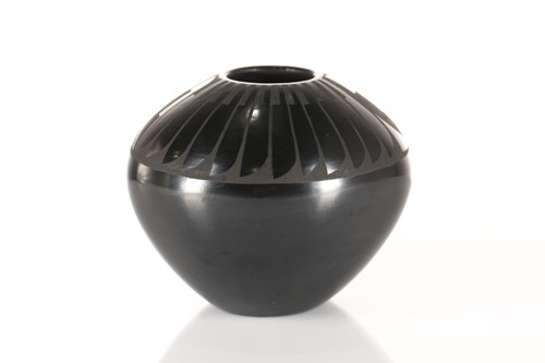 Lot 495 - A Santa Maria Pueblo blackware vase, by...