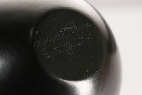 Lot 495 - A Santa Maria Pueblo blackware vase, by...