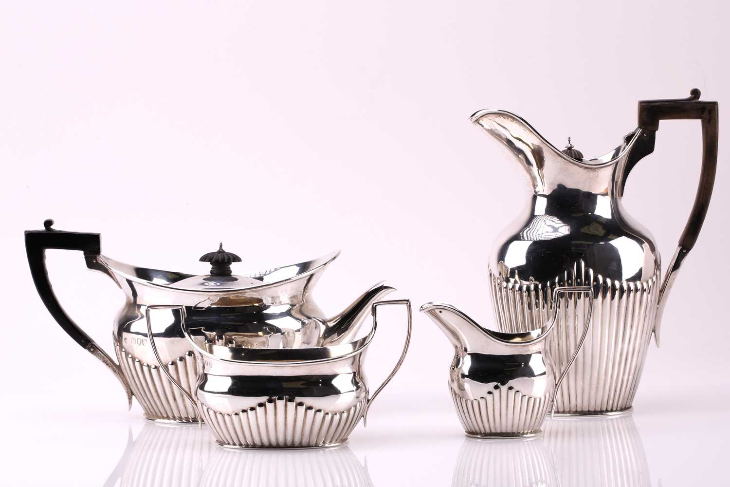 Lot 601 - A Victorian silver four-piece tea set, London...