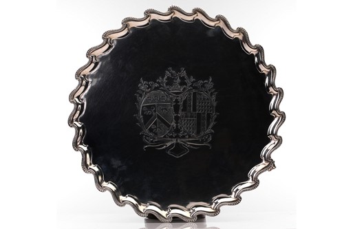Lot 621 - A large George III silver circular salver...