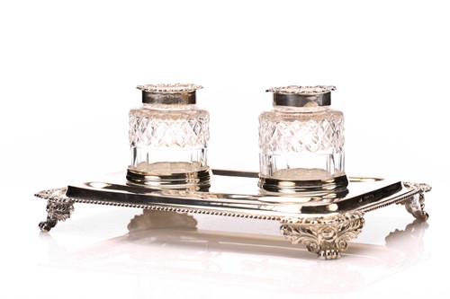 Lot 579 - A George IV  silver inkstand, the two cut...