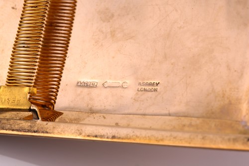 Lot 496 - Asprey, a 9ct gold cigarette case, the engine...