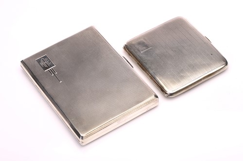 Lot 590 - Two silver cigarette cases, the larger with...