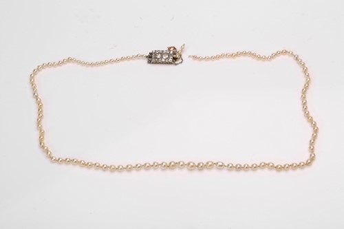 Lot 67 - A Victorian string of natural pearls with a...