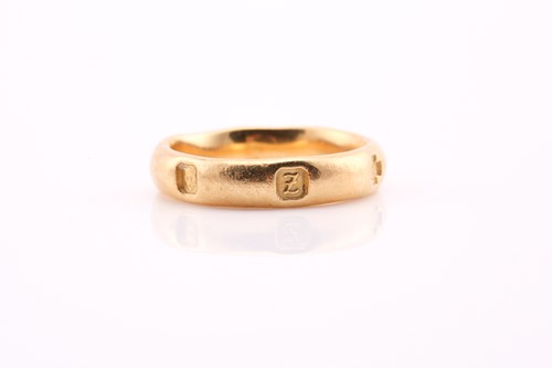 Lot 197 - An 18ct gold wedding band with full Millenium...