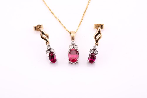 Lot 463 - A ruby and diamond pendant and matching...