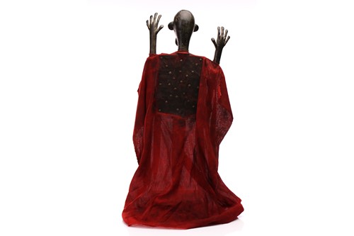 Lot 182 - A Bambara cast bronze and wood marionette,...