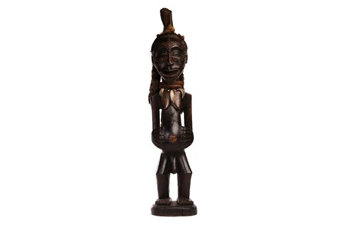 Lot 174 - A Songye hermaphrodite power figure (Nkisi),...
