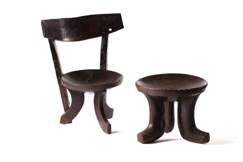 Lot 158 - An Ethiopian dish topped stool on three sturdy...