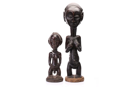 Lot 128 - A large Hemba standing female figure,...