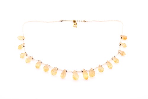 Lot 58 - A seed pearl necklace, strung with briolette...