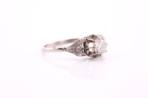 Lot 258 - A single stone diamond ring, the round...