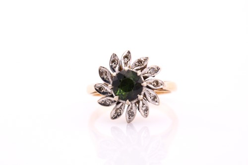 Lot 156 - A tourmaline and diamond cluster ring, the...