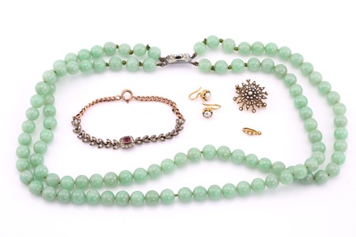 Lot 87 - A lot consisted of a jade necklace, a seed...