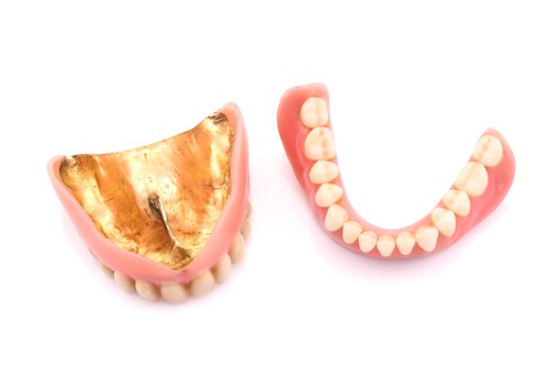 Lot 44 - Pair of false teeth with gold content, 53.8...