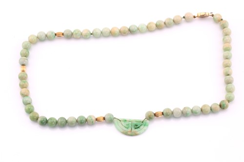 Lot 137 - Single row jade bead necklace, with yellow...