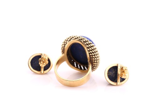 Lot 146 - A lapis lazuli dress ring, the oval lapis...