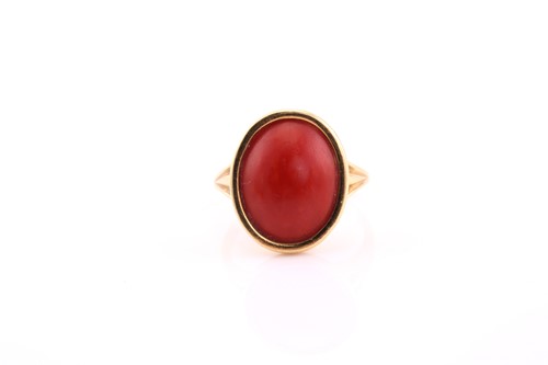 Lot 299 - Red coral ring, modern, the oval coral...