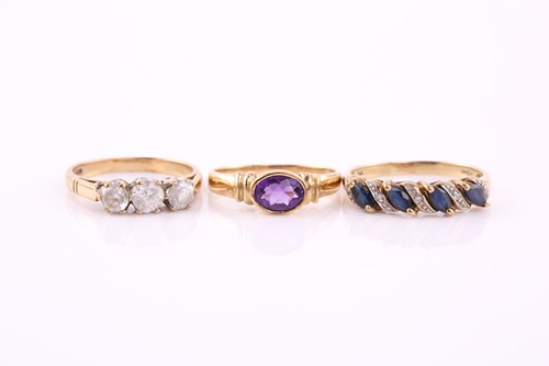 Lot 346 - A lot consisting of three stone set rings in...