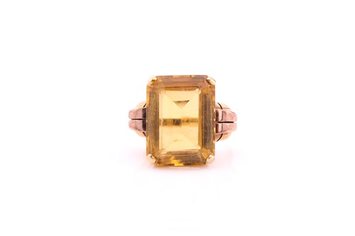 Lot 246 - An Art Deco citrine dress ring, the...