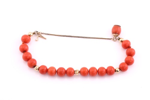 Lot 134 - Red coral bead bracelet, averaging 8.5mm...