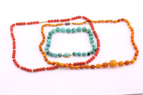Lot 213 - Red coral bead necklace, oval beads from...