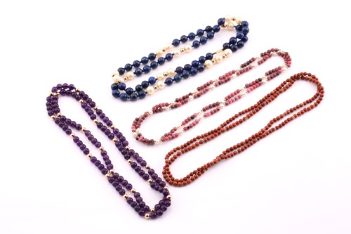 Lot 269 - Four bead necklaces, one in coral, one...