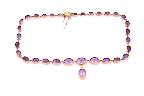 Lot 150 - An amethyst riviere necklace, early 20th...