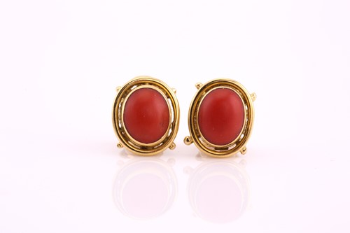 Lot 98 - A pair of coral cabochon earrings, within...