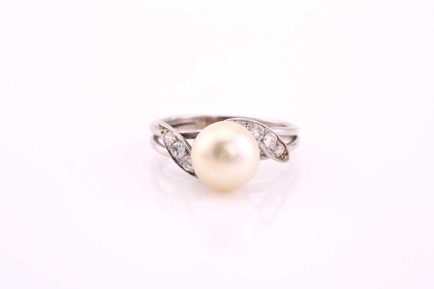 Lot 62 - A cultured pearl and diamond ring, mid 20th...