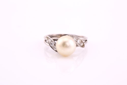 Lot 62 - A cultured pearl and diamond ring, mid 20th...