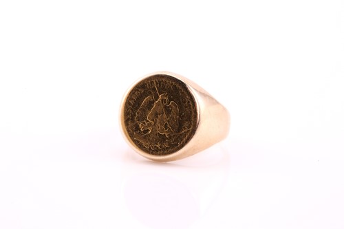 Lot 229 - A Mexican Dos Pesos gold coin inset ring, to a...