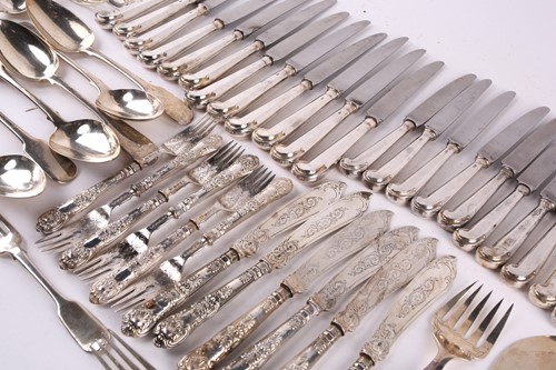 Lot 568 - A collection of silver cutlery, to include -...