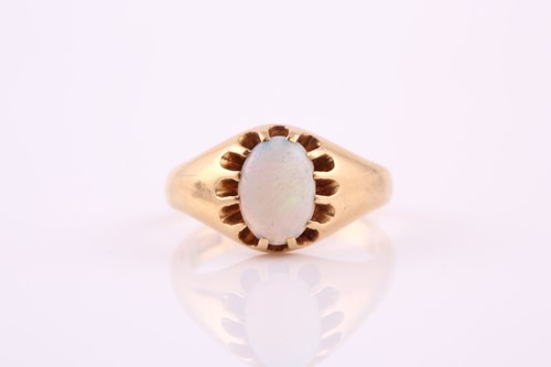 Lot 399 - A single stone opal ring; the oval opal in...