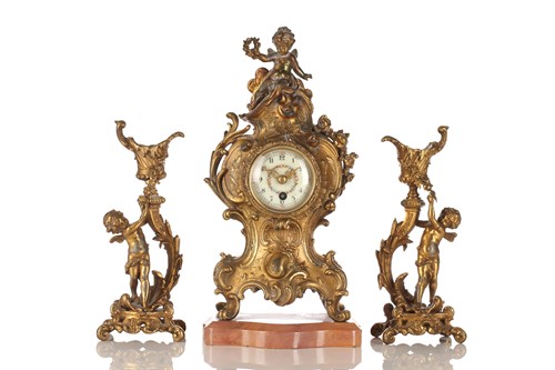 Lot 403 - A 19th century French gilt metal boudoir clock...