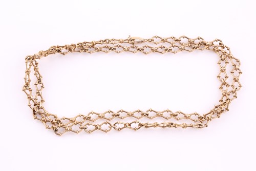 Lot 266 - A 9 carat gold fancy link chain; the figure-of-...