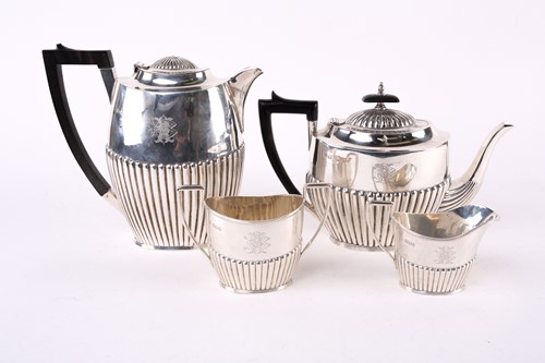 Lot 610 - A composite but matching four-piece silver...
