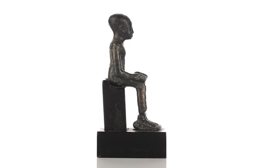 Lot 461 - An Egyptian seated bronze figure of the scribe...