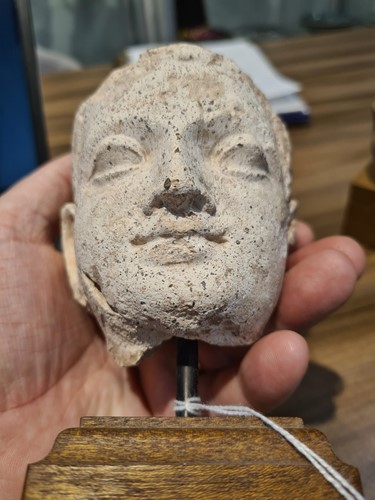 Lot 338 - A Gandharan stucco head of Buddha, 2/3AD,...