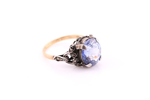 Lot 102 - An oval sapphire single stone dress ring,...