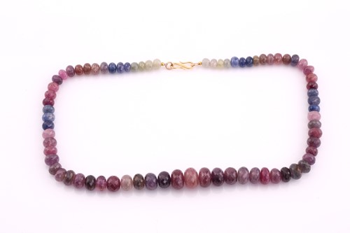 Lot 50 - A sapphire and ruby faceted bead necklace, the...