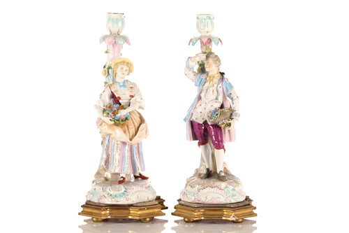 Lot 524 - A pair of Continental porcelain figural...