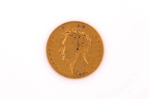 Lot 470 - A George III half Guinea, dated 1827. 3.9 grams